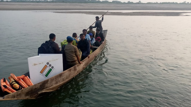 Polling Officials for bye-election to the 26-Shella Assembly Constituency in Meghalaya proceeding towards Kalatek Polling Station which is accessible only by boat. Image: Indigenousherald