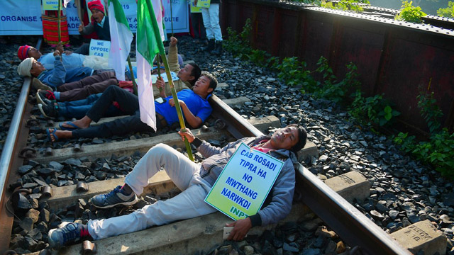 Activists of the Indigenous Nationalist Party of Twipra (INPT) join road-rail blockade agitation at various places in Tripura Thursday to protest against the Citizenship Amendment Bill (CAB) set to be tabled in the parliament next week. Image: Indigenousherald
