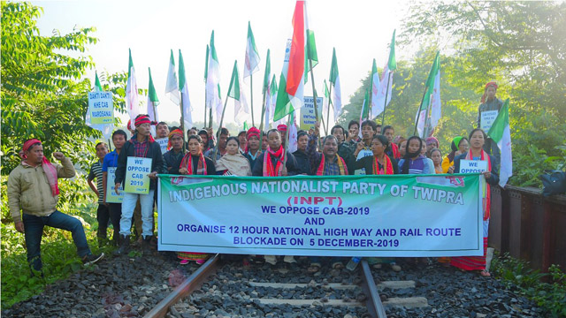 Activists of the Indigenous Nationalist Party of Twipra (INPT) join road-rail blockade agitation at various places in Tripura Thursday to protest against the Citizenship Amendment Bill (CAB) set to be tabled in the parliament next week. Image: Indigenousherald