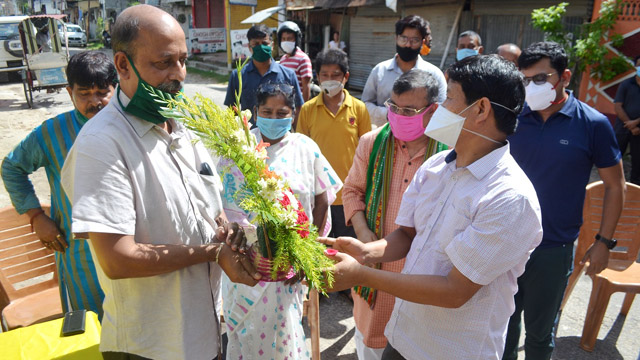 Member of Parliament Pratima Bhowmik greets a cured Covid 19 patient at function in an Agartala locality Monday. Image: Indigenousherald