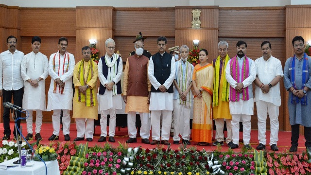 Tripura Governor Satyadev Narayan Arya and Chief Minister Dr Manik Saha with 11 ministers of newly inducted Ministers at the swearing-in ceremony held at Raj Bhavan in Agartala Monday. Image: Indigenousherald 