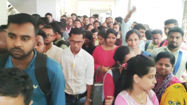 TET (Teacher Eligibility Test) aspirants crowd to collect their pass certificates from the TRBT here Friday. Image: Indigenousherald