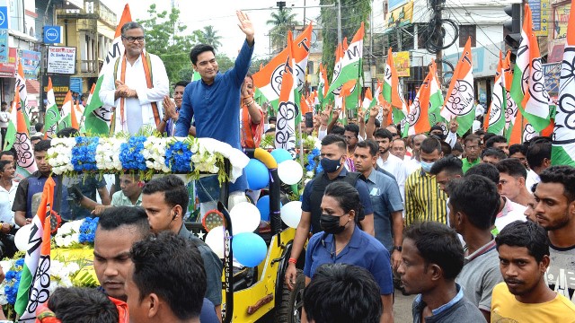 All India Trinamool Congress General Secretary Abhishek Banerjee waves at the crowd during a roadshow in Agartala Tuesday in support of party candidates contesting in ensuing by-elections in Tripura. Image: Indigenousherald