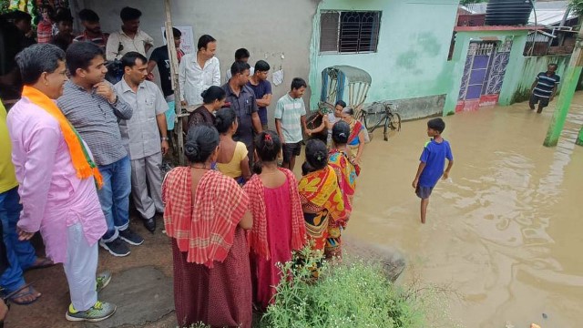 Tripura Chief Minister Dr Manik Saha visits a locality flooded by rain waters near Agartala Saturday. Image: Indigenousherald  