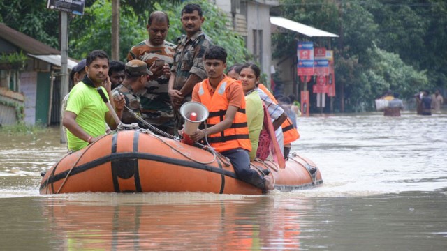 NDRF personnel rescue flood affected people in Baldakhal area near Agartala Saturday. Image: Indigenousherald 