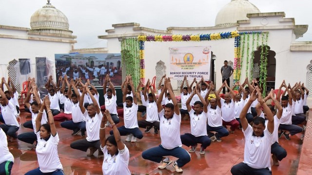 BSF troop perform Yoga at the royal summer place Neer Mahal in Sepahijala district Tuesday on occasion of 8th International Day of Yoga. Image: Indigenousherald 