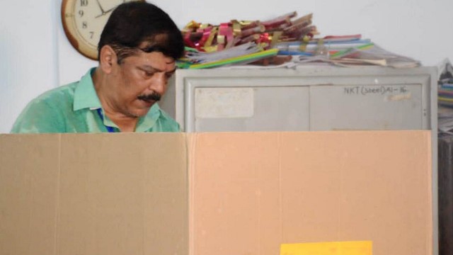 Congress candidate and former health minister Sudip Roy Barman casts his vote at a polling centre in Agartala in assembly by-elections in Tripura Thursday. Image: Indigenousherald 