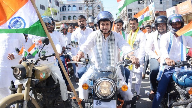 Former Chief Minister Biplab Kumar Deb rides in a motorbike rally in his home constituency in Agartala Thursday to promote Har Ghar Tiranga Campaign. Inage: Indigenousherald 