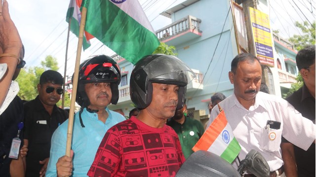 Tripura Chief Minister Dr Manik Saha takes part in a motorbike rally as a part of the Har Ghar Tiranga campaign in Agartala Friday. Image: Indigenousherald 
