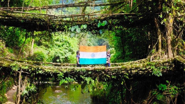 Indian national flag unfurled astride the iconic Double Decker Living Root Bridge in Meghalaya. Image: DIPR