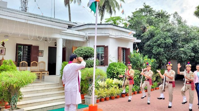 Former Tripura Chief Minister Biplab Kumar Deb salutes guard of honour after unfurling national flag at his residence in Agartala Monday. Image: Indigenousherald 