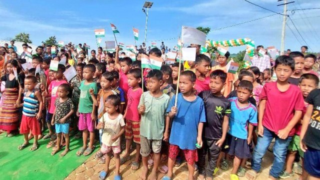 Children at a Mizoram Bru refugee settlement in Dhalai district attend Independence Day celebration during visit of former Tripura Chief Minister Biplab Kumar Deb Monday. Image: Indigenousherald