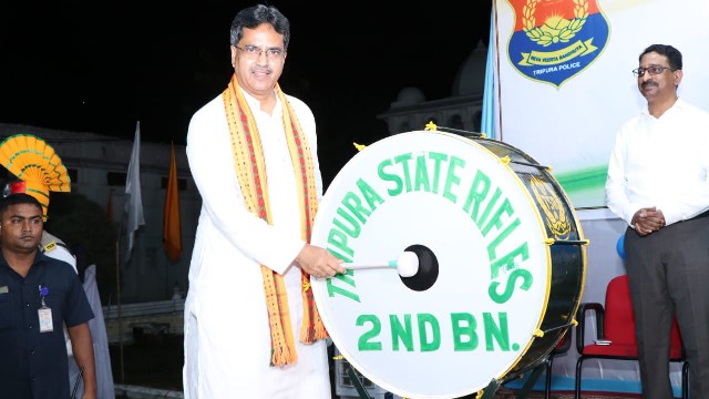 Tripura Chief Minister Dr Manik Saha beats the drum as a custom at a programme organised by the Tripura State Rifles in Agartala Saturday. Image: Indigenousherald  