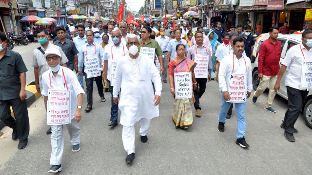 Former Chief Minister Manik Sarkar leads a protest rally near Agartala Friday against alleged targeted violence. Image: Indigenousherald 