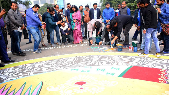 The Office of Tripura Chief Electoral Officer organises Rangoli or Alpana ritualistic floor drawing completion in Agartala Saturday to spread awareness on franchise. Image: Indigenousherald