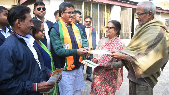 Tripura Chief Minister Dr Manik Saha joins supporters during a door-to-door campaign in his Town Bordowali assembly constituency in Agartala Thursday. Image: Indigenousherald