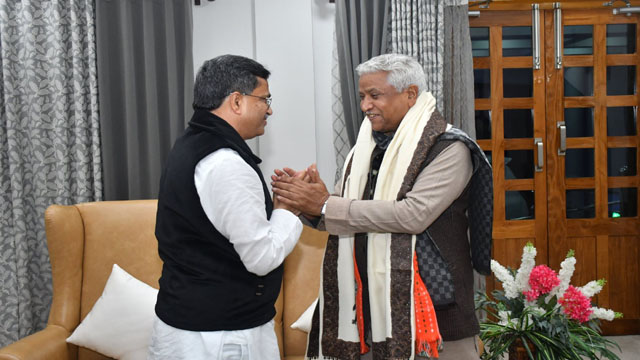 Tripura Chief Minister Dr Manik Saha greets RSS leader Ram Lal at his official residence in Agartala Friday. Image: Web