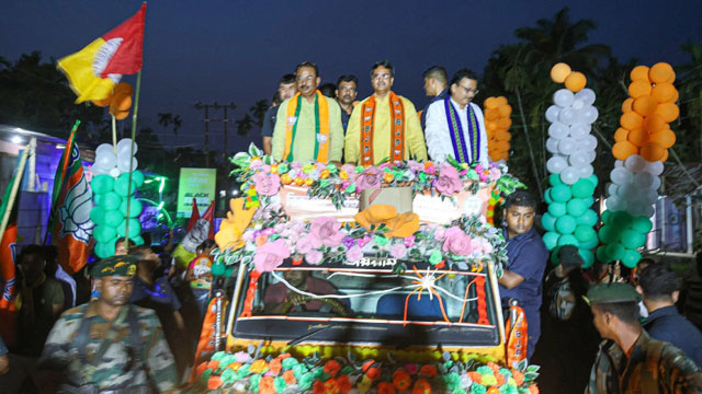 Tripura Chief Minister Dr Manik Saha accompanied by BJP state President Rajib Bhattacharjee joins a road show Sunday in Ambassa of Dhalai district in support of BJP candidate for East Tripura (ST) Lok Sabha constituency Kriti Devi Debbarma. Image: Web