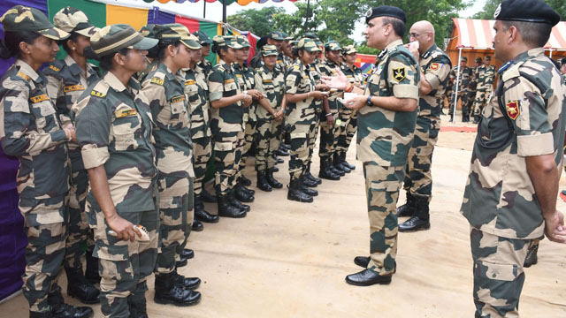 Ravi Gandhi, ADG of Eastern Command, BSF, interacts with female members of the BSF at a border location in Sepahijala district, Tripura. Image: BSF