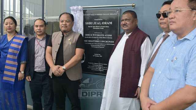 Union Minister for Tribal Affairs Jual Oram inaugurates a community hall at Chümoukedima in Nagaland Tuesday. Image: DIPR