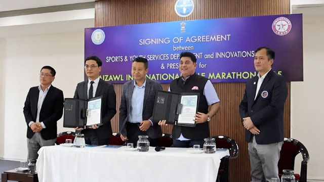 A partnership agreement on Aizawl International Half Marathon 2025 signed between Sports & Youth Services Department and Innovations India Pvt Ltd in the presence of Sports Minister Lalnghinglova Hmar at Aizawl Tuesday. Image: DIPR