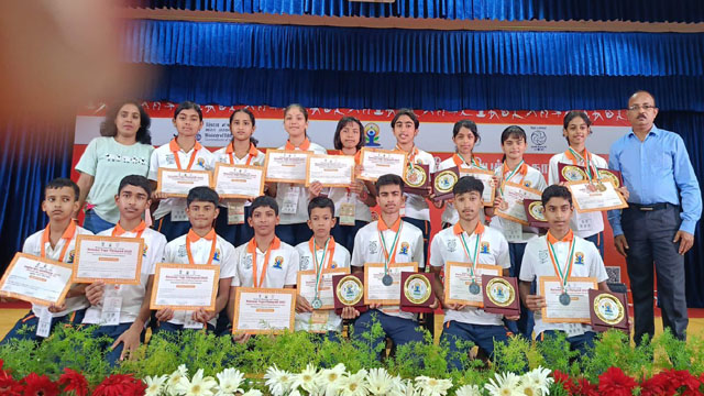 A team of 16 students from Tripura selected by the SCERT exhibited skill at the National Yoga Olympiad 2025 held in Kanyakumari. Image: Web