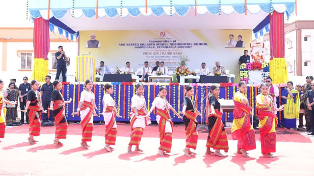 Indigenous school girls perform traditional dance during inauguration of 12th out of 21 sanctioned EMRSs at Jampuijala in Sepahijala district graced by Tripura Chief Minister Dr Manik Saha Thursday. Image: DICA