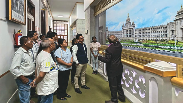 A 14-member team of journalists from Meghalaya and Tripura, currently on a media tour, visits Bengaluru’s iconic Vidhana Soudha, the seat of Karnataka’s legislature. Image: PIB