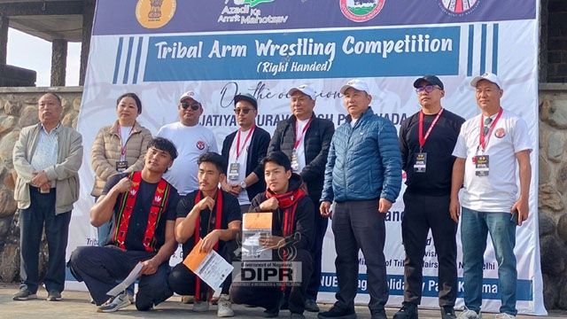 Director of Tribal Affairs I Sino Phom and officials with the Winners of the Tribal Arm Wrestling Competition held at NSF Solidarity Park in Kohima Wednesday. Image: DIPR