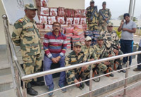 bsf seizes consignments of sarees worth 31-39 lakhs
