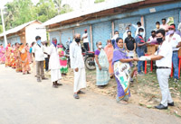 covid-19 ongc association distributes food among needy